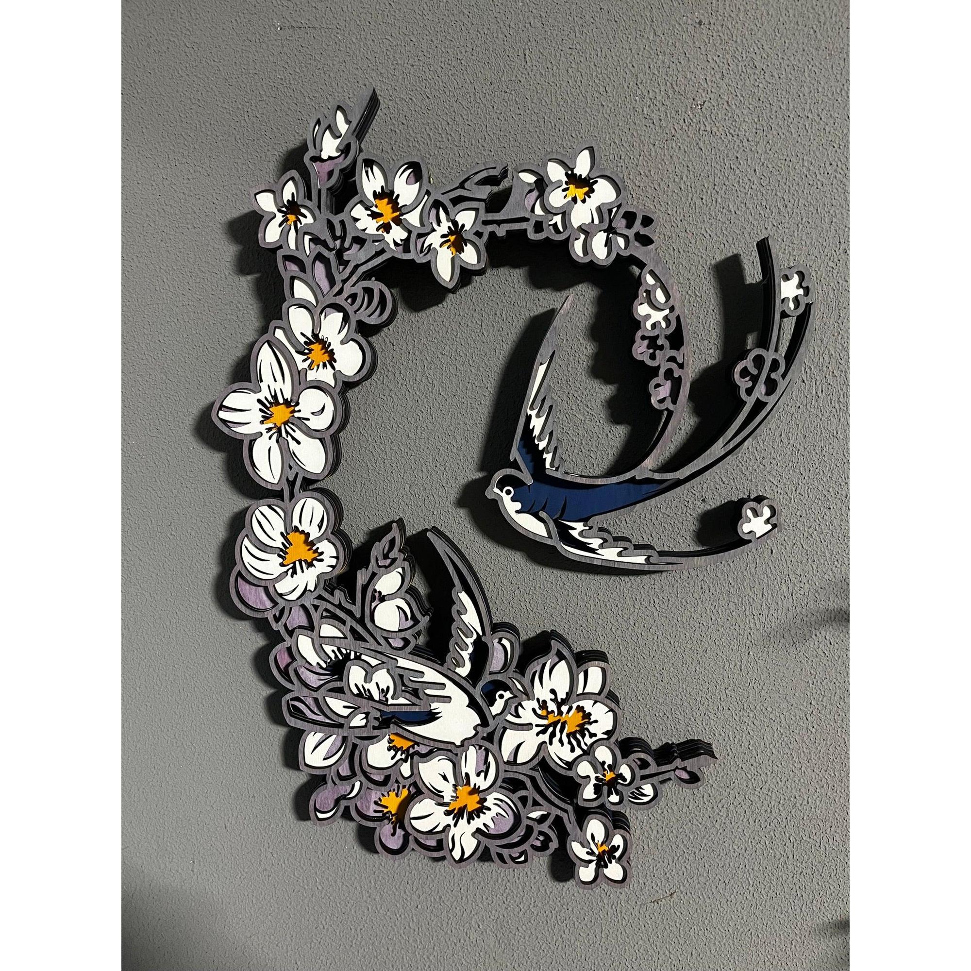 Schwalbe mit Blüten